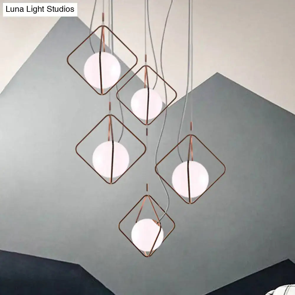 Decorbites modern square suspension light with copper metal frame and frosted glass orb shades for living room