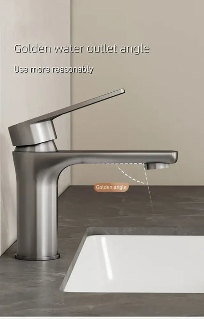 DecorBites™ modern stainless steel bathroom sink faucet with brushed finish and golden water outlet angle