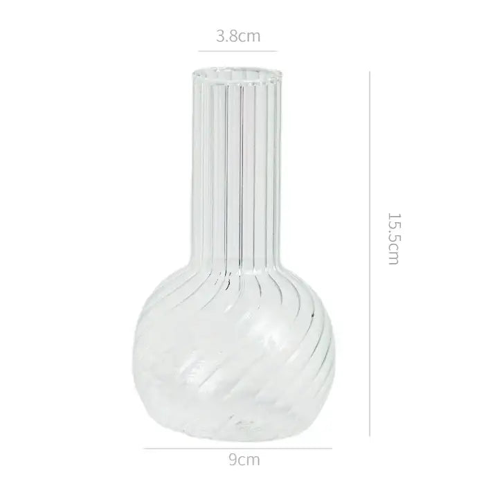 Decorbites modern transparent glass vase with vertical ridges and swirling patterns to decorate root spaces width 750px height