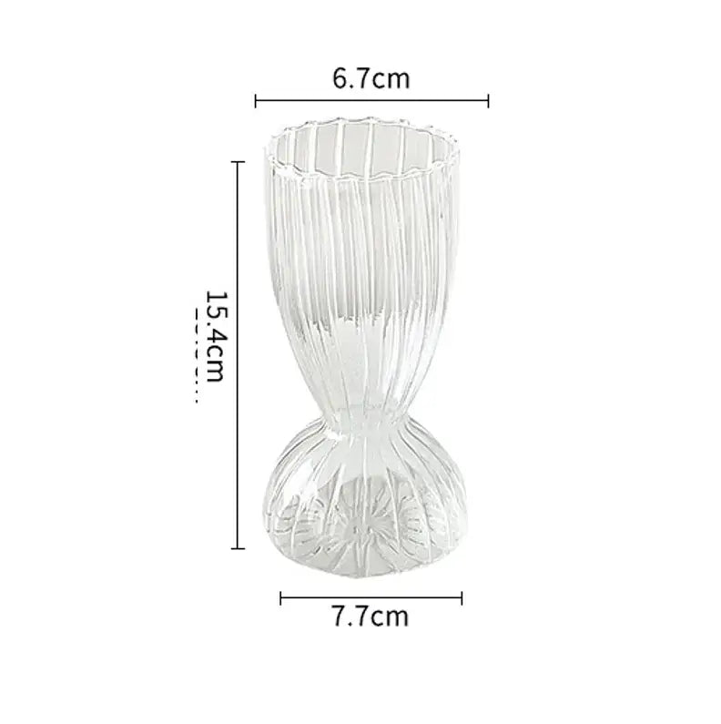 DecorBites™ modern transparent glass vase with vertical ribbed texture and ornate floral base for home decorate root
