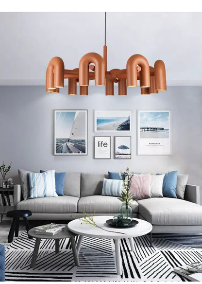 DecorBites modern u-shaped copper-toned led ceiling chandelier with industrial pipe-like curved arms and central rod