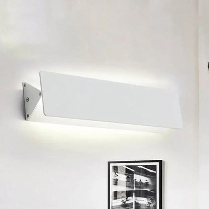 Modern white rectangular wall light with sleek metallic bracket offers direct wired electric outdoor illumination