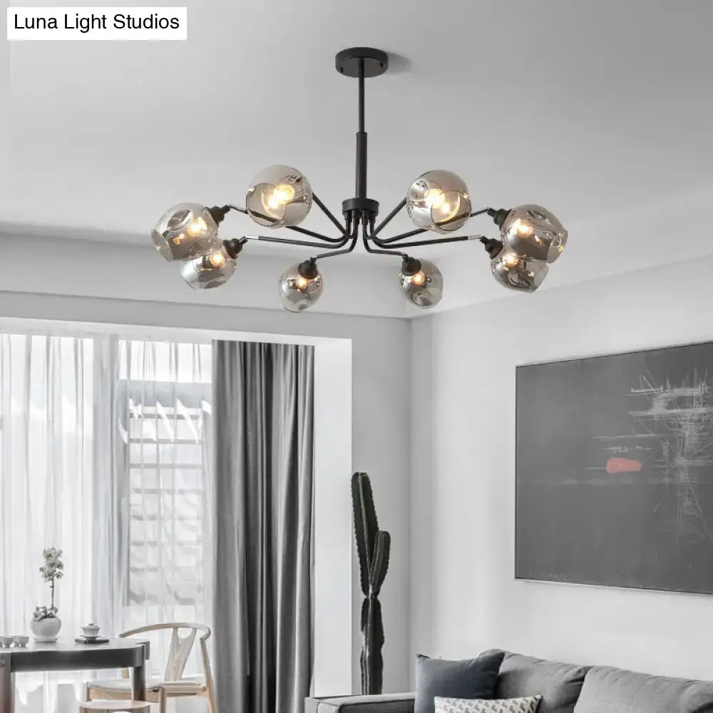 Modern black metal chandelier with six frosted cup shape smoke grey glass globes for living room lighting