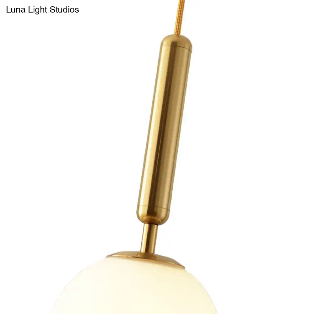 Decorbites™ modernist white glass pendant light with gold finish and frosted glass globe in adjustable inches fixture