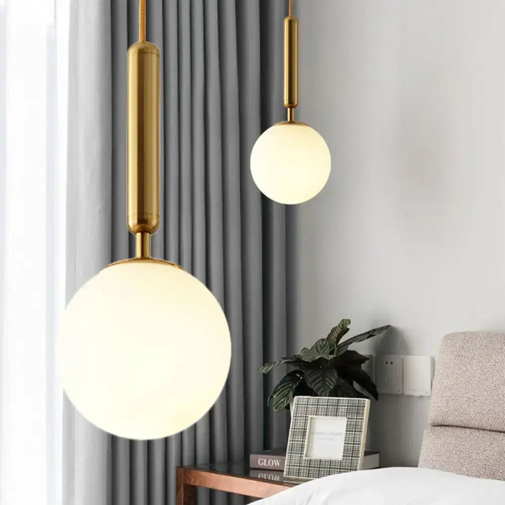 Decorbites modernist pendant light with white glass spherical shades and gold finish adjustable inches fixture