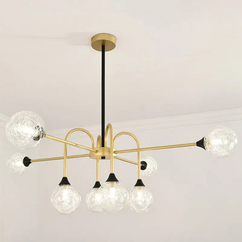 Gold-toned decorbites modo glass suspension light with six clear textured glass globes and black accents for dining room