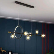 Decorbites molecular dining room island pendant light featuring modern black and brass design with spherical glass bulbs