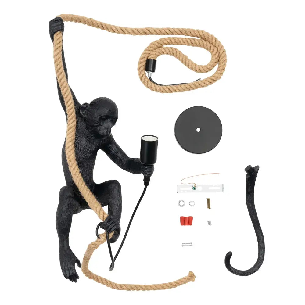 Black monkey-shaped wall lamp with hemp rope details and cylindrical light fixture rope chandelier by DecorBites™