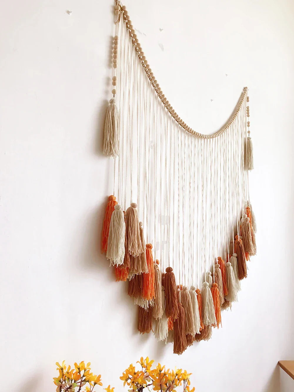 Decorbites moroccan bohemian wall decor tapestry with wooden beads and white macrame cords with orange tassels