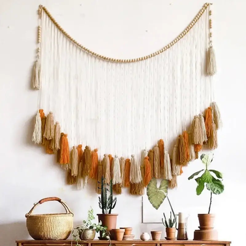 Beige and orange macrame wall decor tapestry with wooden beads and tassels for moroccan bohemian wall decoration
