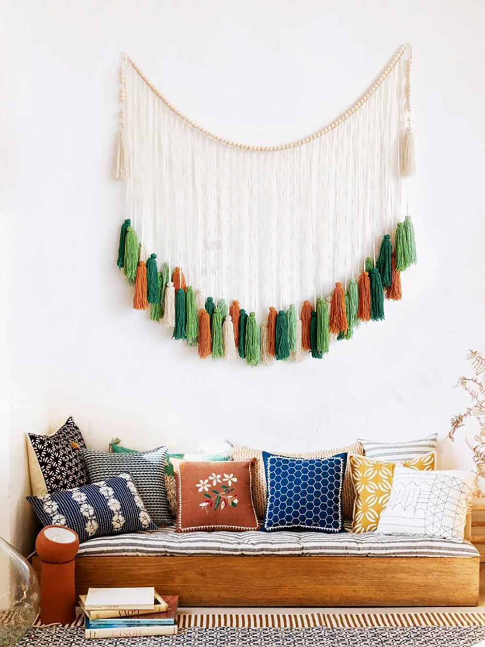 DecorBites moroccan bohemian wall decor tapestry made of cream macrame cords with green orange and beige tassels