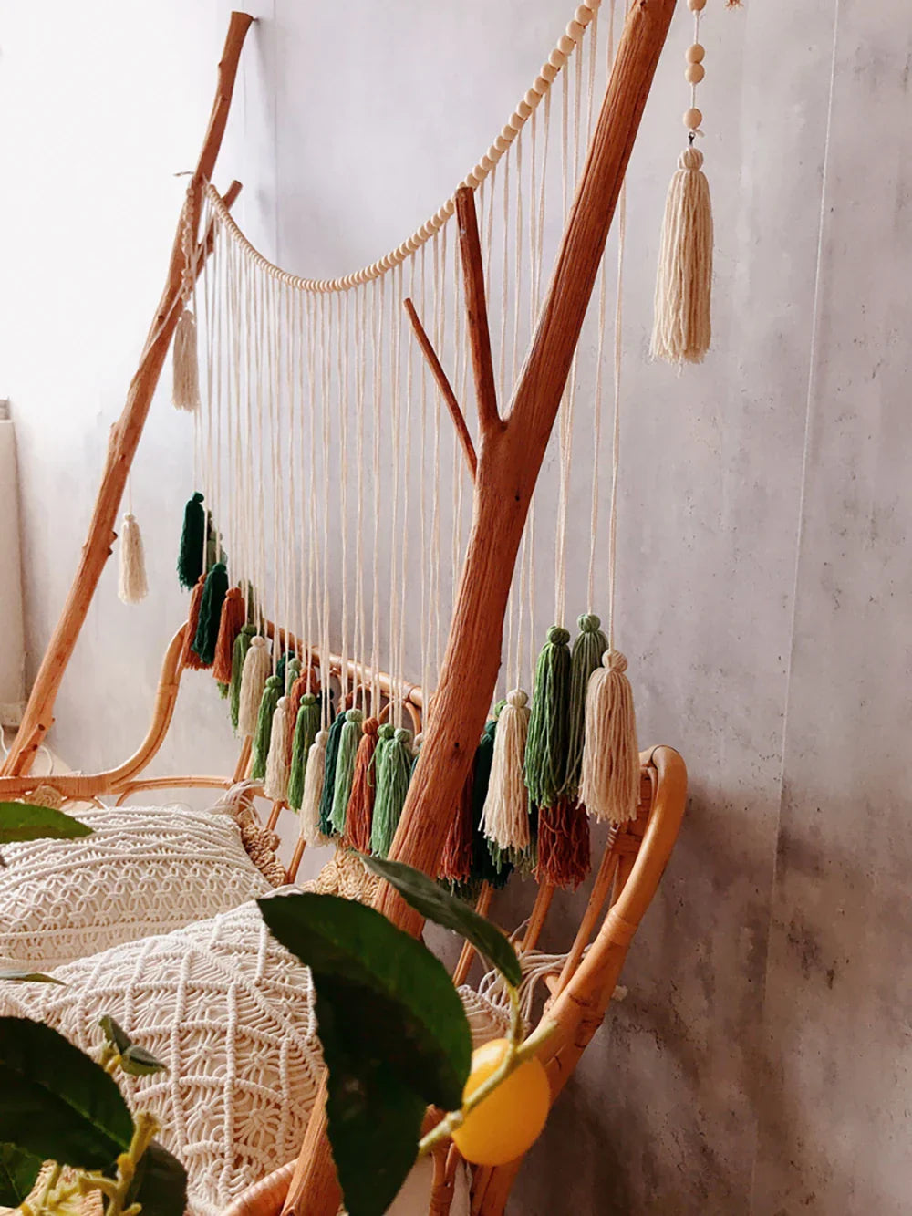 Natural wood branch macrame wall hanging with cream and green tassels for moroccan bohemian wall decor tapestry
