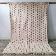 Beige moroccan handmade beni ouarain rug 3m x 2m with textured hand-knotted weave and pink brown embroidered motifs