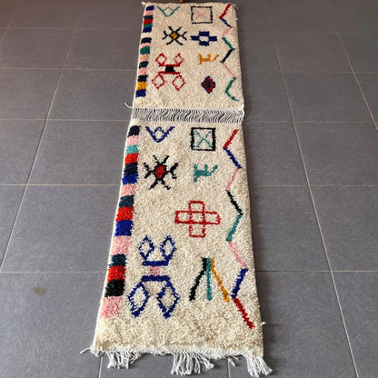 Beige DecorBites moroccan handmade small beni ouarain rug with colorful geometric patterns and fringed edges 1m by 70cm