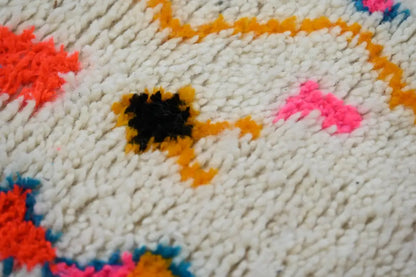 Decorbites moroccan handmade azilal hallway rug with white base and bold orange pink black blue geometric patterns
