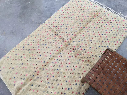 Beige woven moroccan handmade azilal rug with colorful pink blue and black dots in pure natural wool 244 x 148 cm