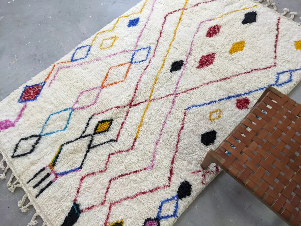 DecorBites™ cream-colored moroccan handmade traditional azilal rug with vibrant geometric pattern 252 x 160 cm