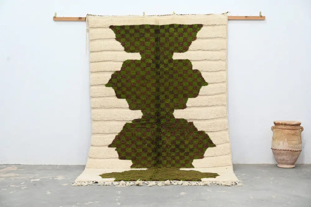 Cream-colored DecorBites™ moroccan handmade traditional azilal rug with bold green geometric pattern and textured woven surface