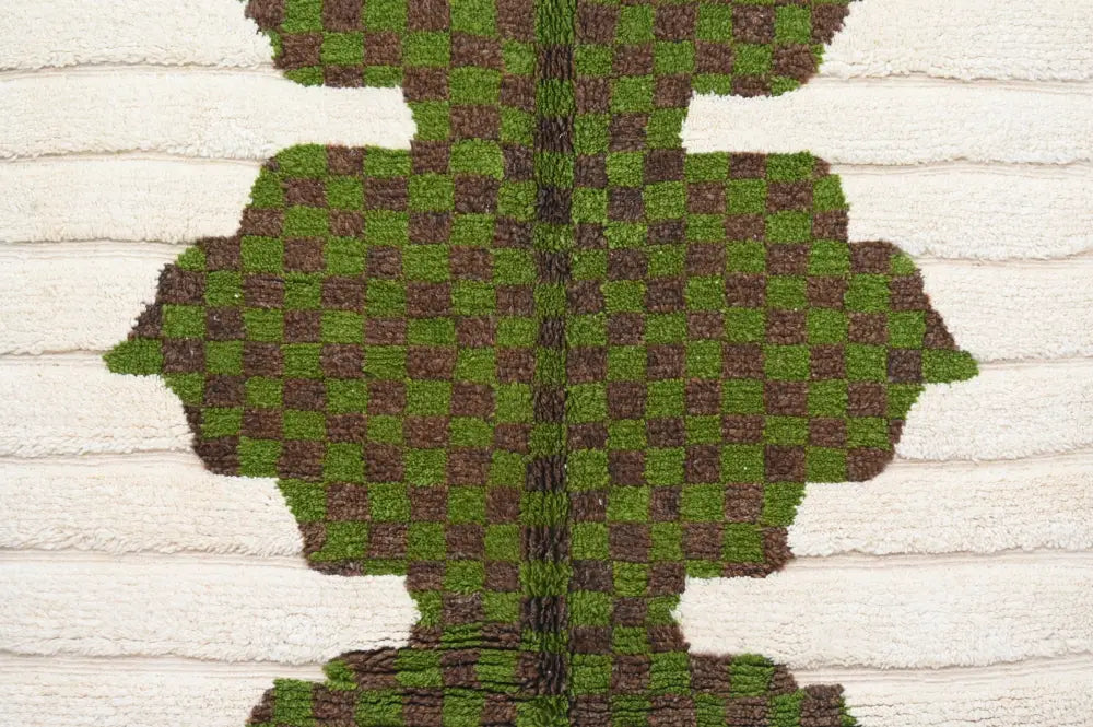 A plush green and brown checkerboard patterned moroccan handmade traditional azilal rug by decorbites
