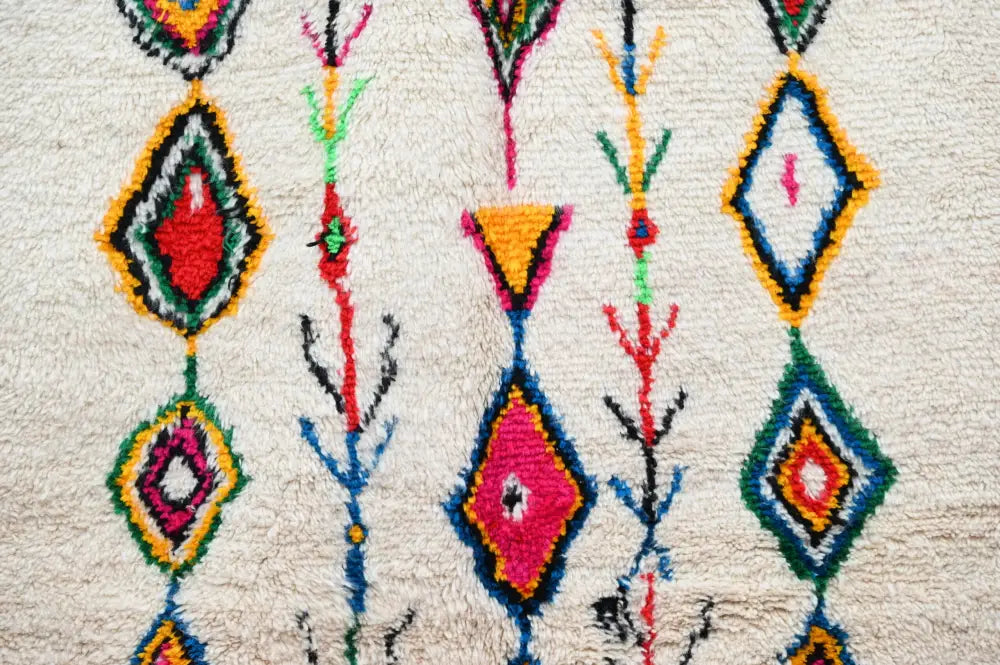 DecorBites™ moroccan handmade traditional azilal rug with vibrant geometric patterns on plush white wool base 262 x 157 cm