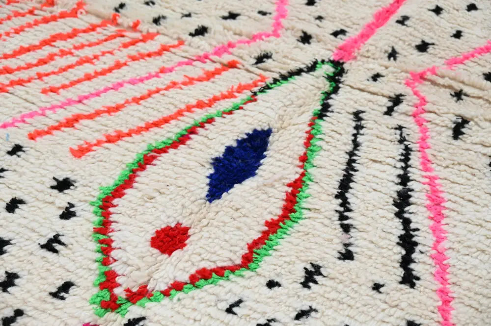 Decorbites™ moroccan handmade traditional azilal rug with vibrant geometric patterns in cream pink orange and black