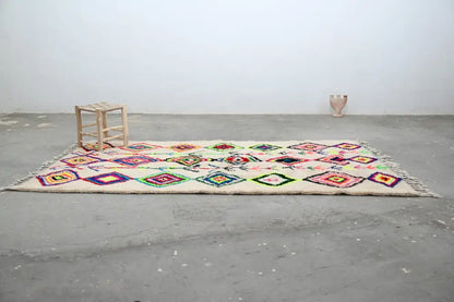 Decorbites™ moroccan handmade traditional azilal rug cream color with colorful geometric patterns and fringed edges 267 x 150 cm