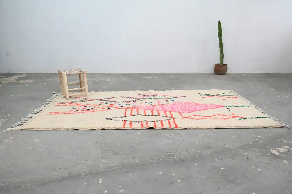 Cream-colored DecorBites™ moroccan handmade traditional azilal rug with bold pink red and green geometric patterns 268 x 157 cm