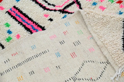 Beige DecorBites™ moroccan handmade traditional azilal rug with vibrant pink black and multicolored wool geometric patterns