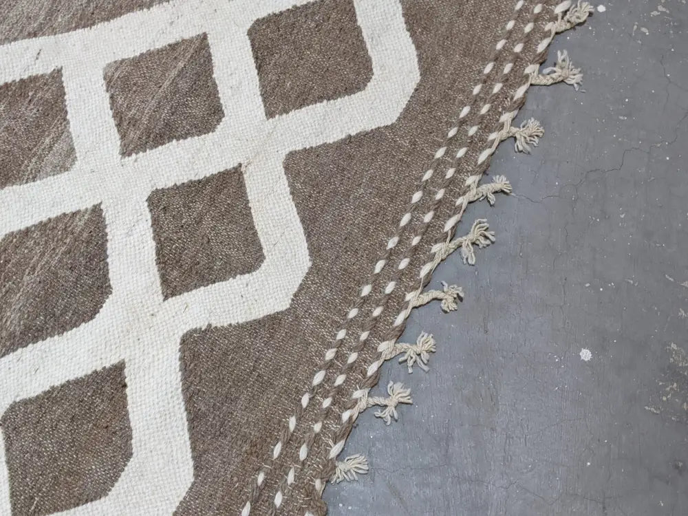 Brown and cream geometric patterned moroccan handmade traditional azilal rug with fringed edges 309 x 200 cm