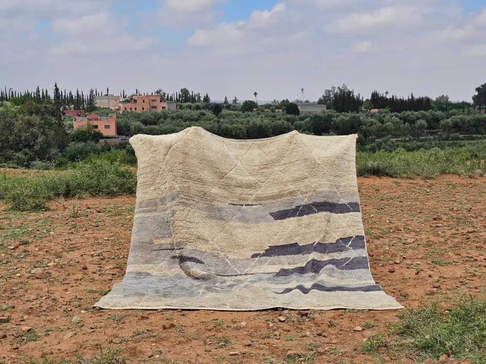 Beige and gray striped beni mrirt rug with textured hand-knotted design from decorbites moroccan handmade collection