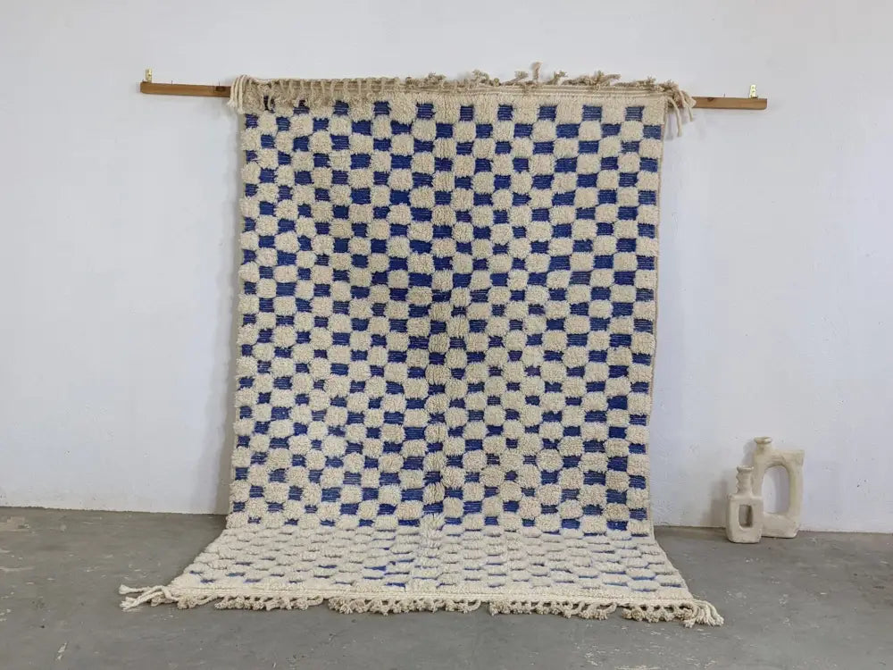 Decorbites moroccan handmade beni ouarain rug with blue and cream checkered pattern and fringed edges 260 x 170 cm