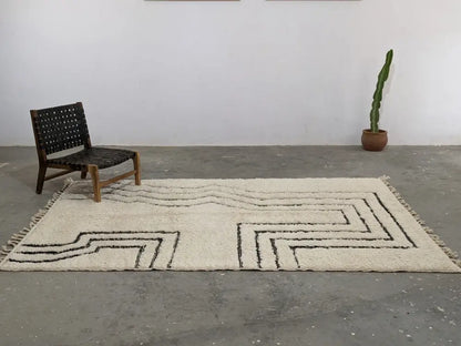 Decorbites™ moroccan handmade beni ouarain rug cream-colored wool with bold black geometric patterns and fringed edges