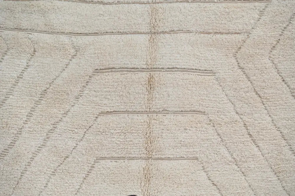 Beige plush beni ouarain rug with geometric raised textured lines in a 285 x 205 cm DecorBites handmade design