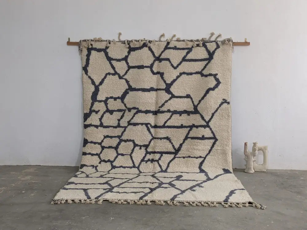 Beige and navy blue geometric patterned moroccan handmade beni ouarain wool rug with fringed edges 297 x 208 cm