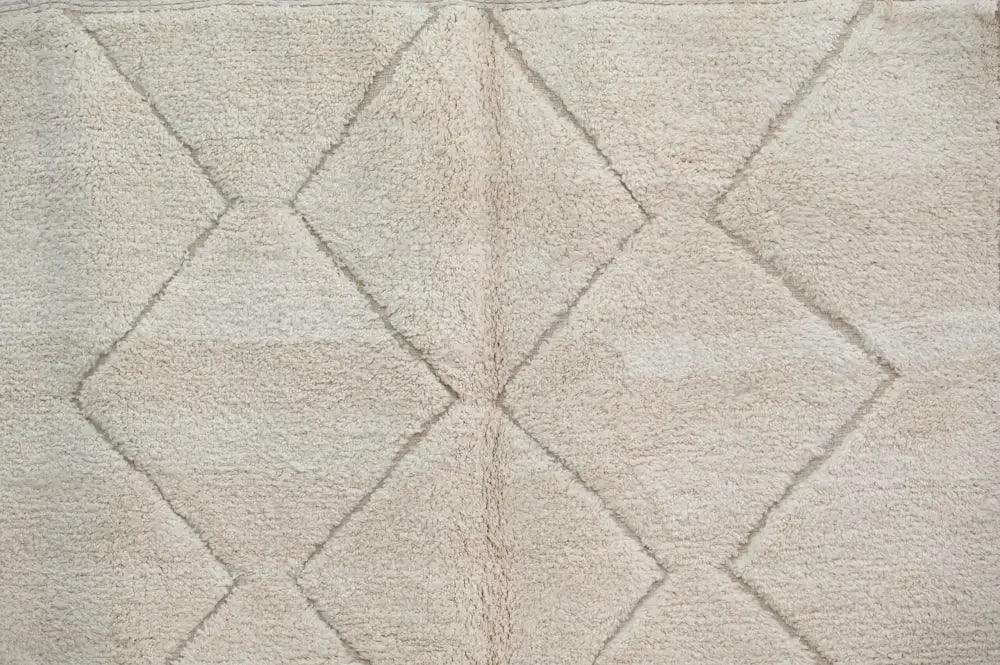 Beige moroccan handmade beni ouarain rug with plush textured surface and geometric diamond patterns 300 x 212 cm