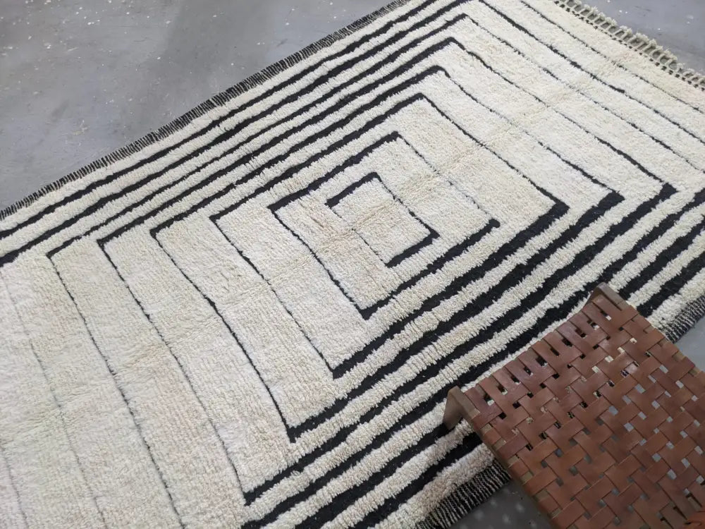 Decorbites™ moroccan handmade beni ouarain rug in black and off-white with textured woven geometric design 344 x 216 cm