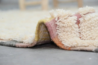 Decorbites™ moroccan traditional handmade azilal rug 240x147cm with a soft cream woolen surface and pink yellow stripes