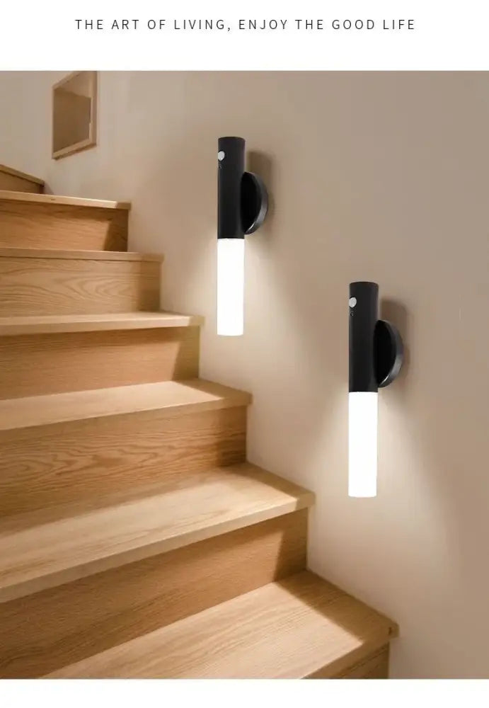 Stairway with wall-mounted decorbites motion sensor battery operated black wall lamps providing efficient lighting