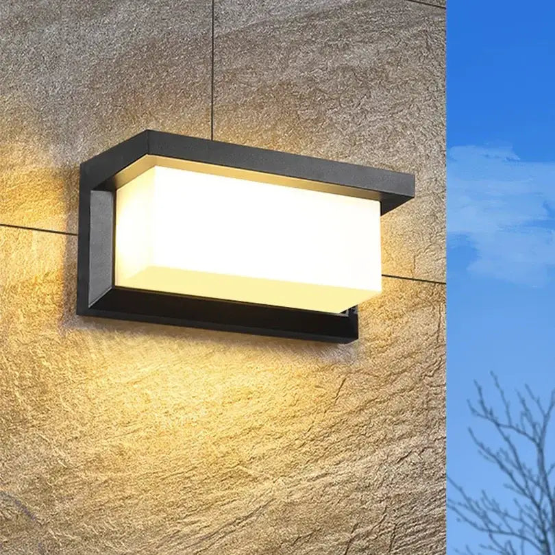 Modern black decorbites motion sensor outdoor wall light with warm white illuminated panel and waterproof design