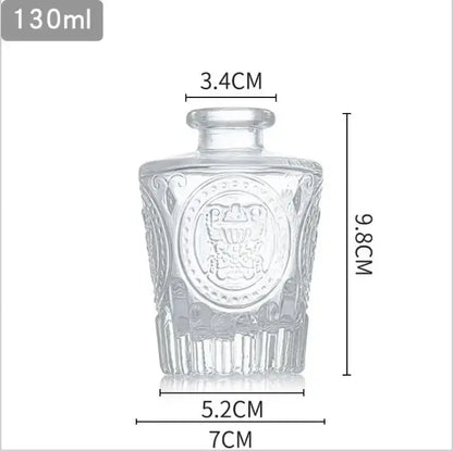 Clear glass vase with intricate embossed design rounded neck opening 2cm suitable as a flower pot home gift