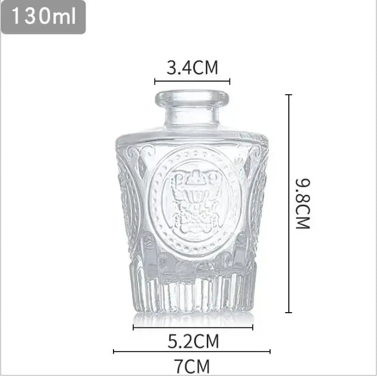 Clear glass vase with intricate embossed design rounded neck opening 2cm suitable as a flower pot home gift
