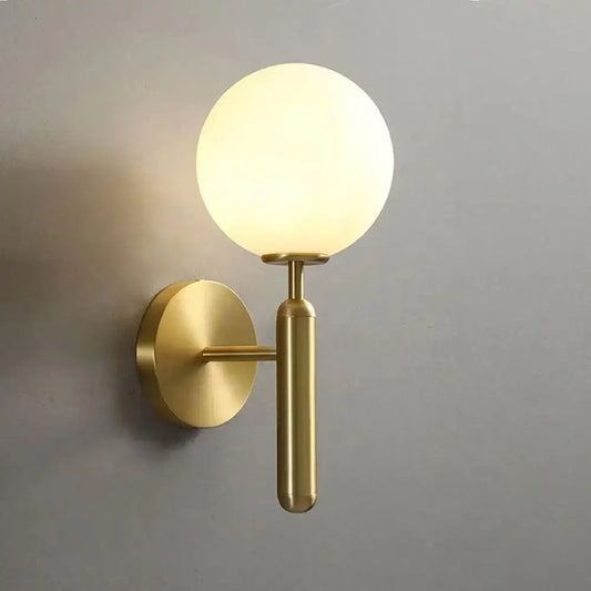 Gold-finished decorbites mynate wall sconce with frosted glass globe for luxury indoor lighting decor