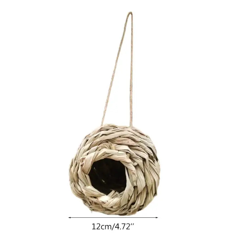 Beige hand-woven natural grass bird cage by DecorBites with hanging rope for outdoor style birds nest decor