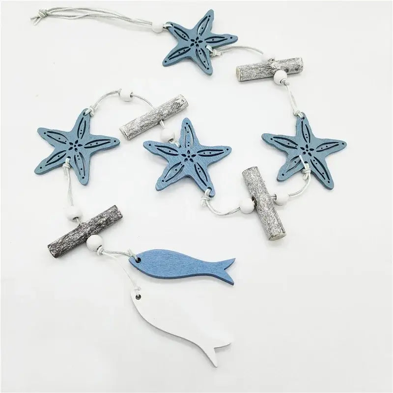 DecorBites™ nautical theme wall decor featuring blue and white wooden fishing net decoration with starfish and driftwood accents