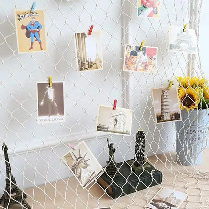 White mesh fishing net decoration with colorful photos clipped, nautical theme wall decor by DecorBites™ for home