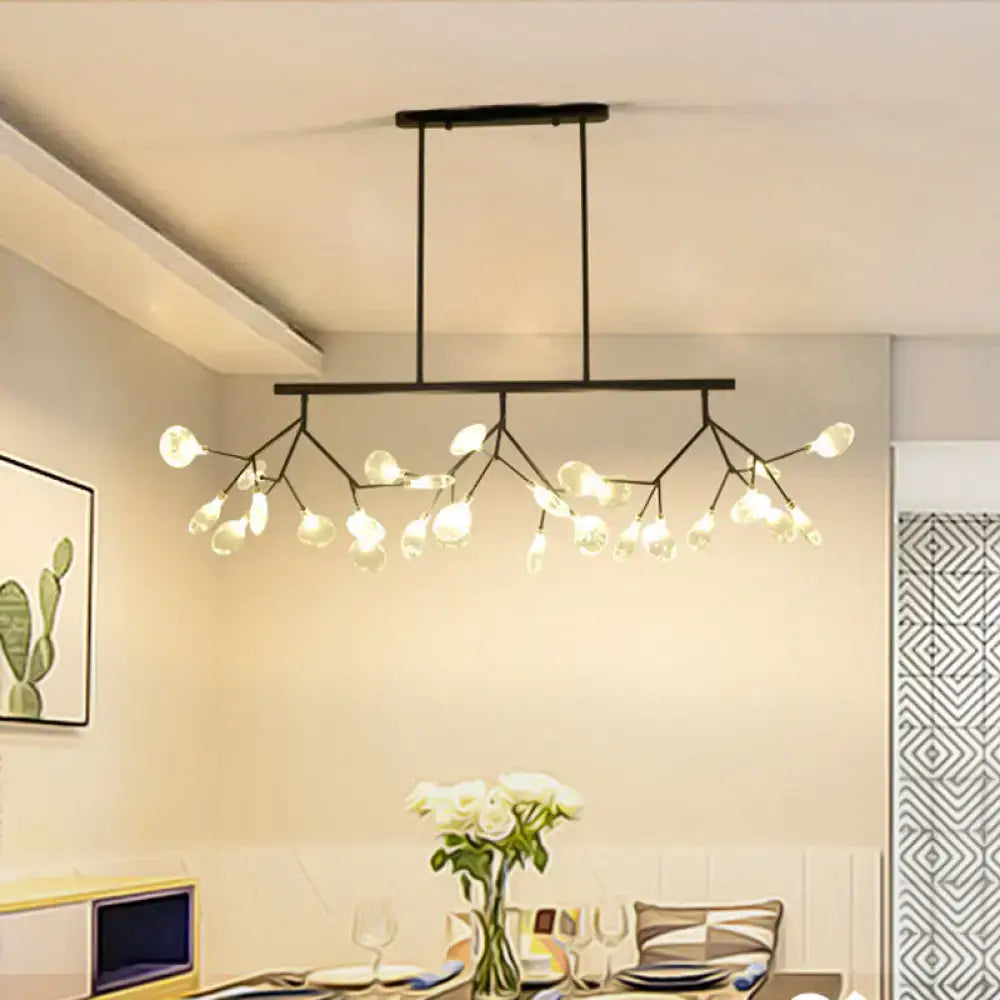 Modern black metal ceiling light with tree branch glass pendant and frosted globe bulbs for dining room decor