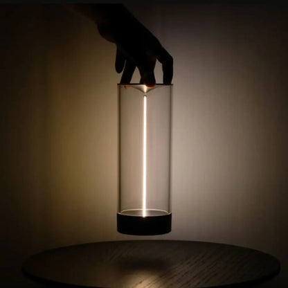 Decorbites™ nordic battery operated table lamp with sleek transparent cylindrical design and glowing vertical light strip