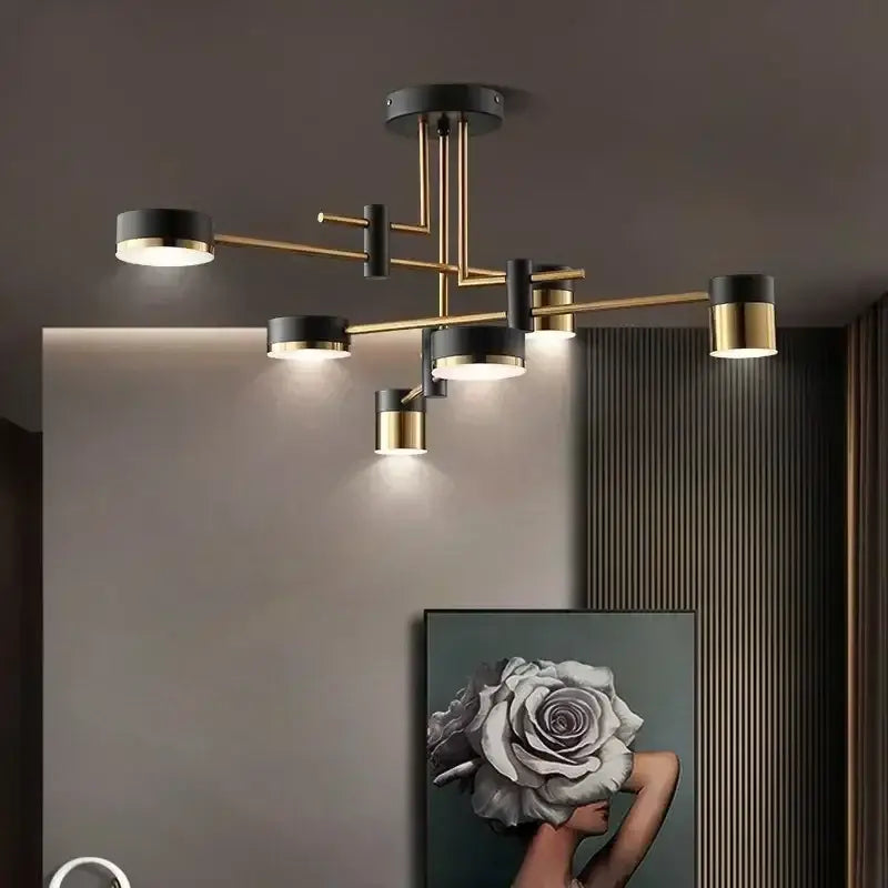 Modern black and gold geometric pendant light with cylindrical fixtures ideal for nordic black gold living room decor