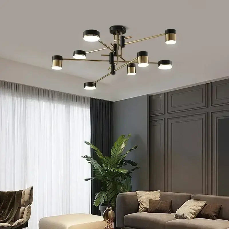 Modern black and brass nordic black gold pendant light with cylindrical fixtures for elegant living room decor