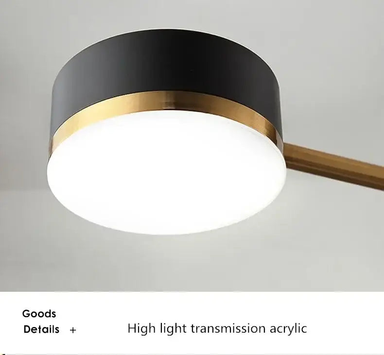 Modern black and gold ceiling pendant light with sleek circular design for living room decor by decorbites nordic black gold